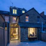 View from garden to modern Victorian terrace side return by Space Program Architects